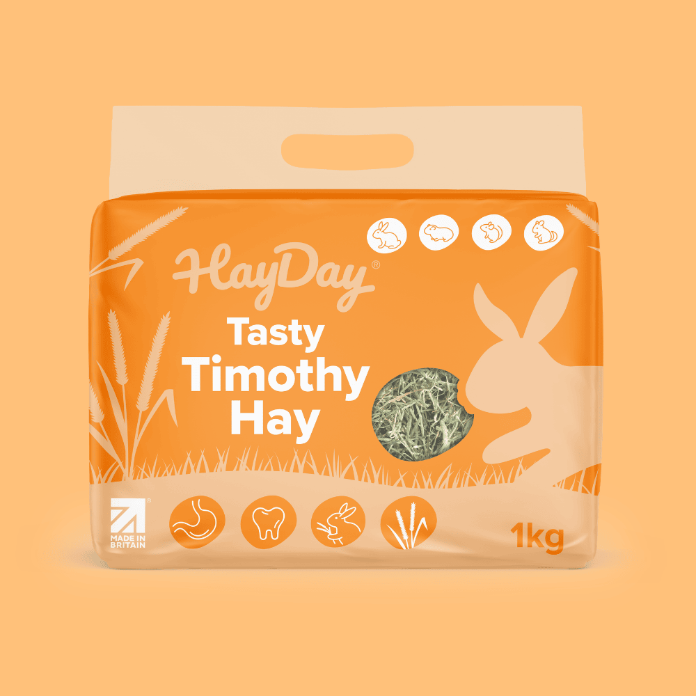HayDay Tasty Timothy Hay 1kg packaging on an orange background.