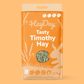 HayDay Timothy Hay 2.7kg packaging on a orange background.